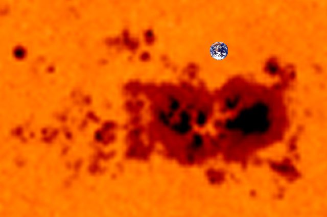 2000-09-23 Sunspot group compared to the Earth
